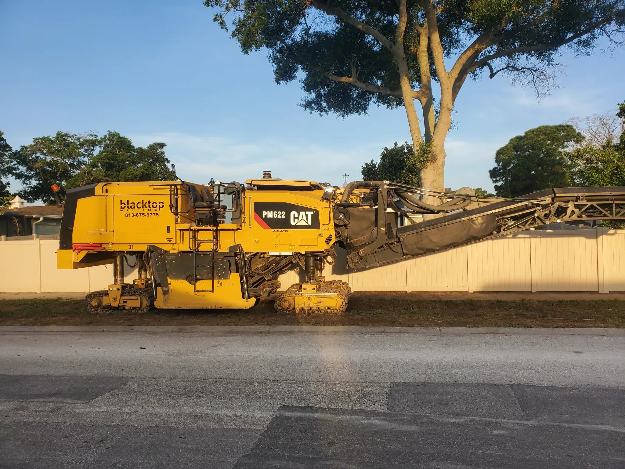 Blacktop Florida crew working at dawn on commercial site